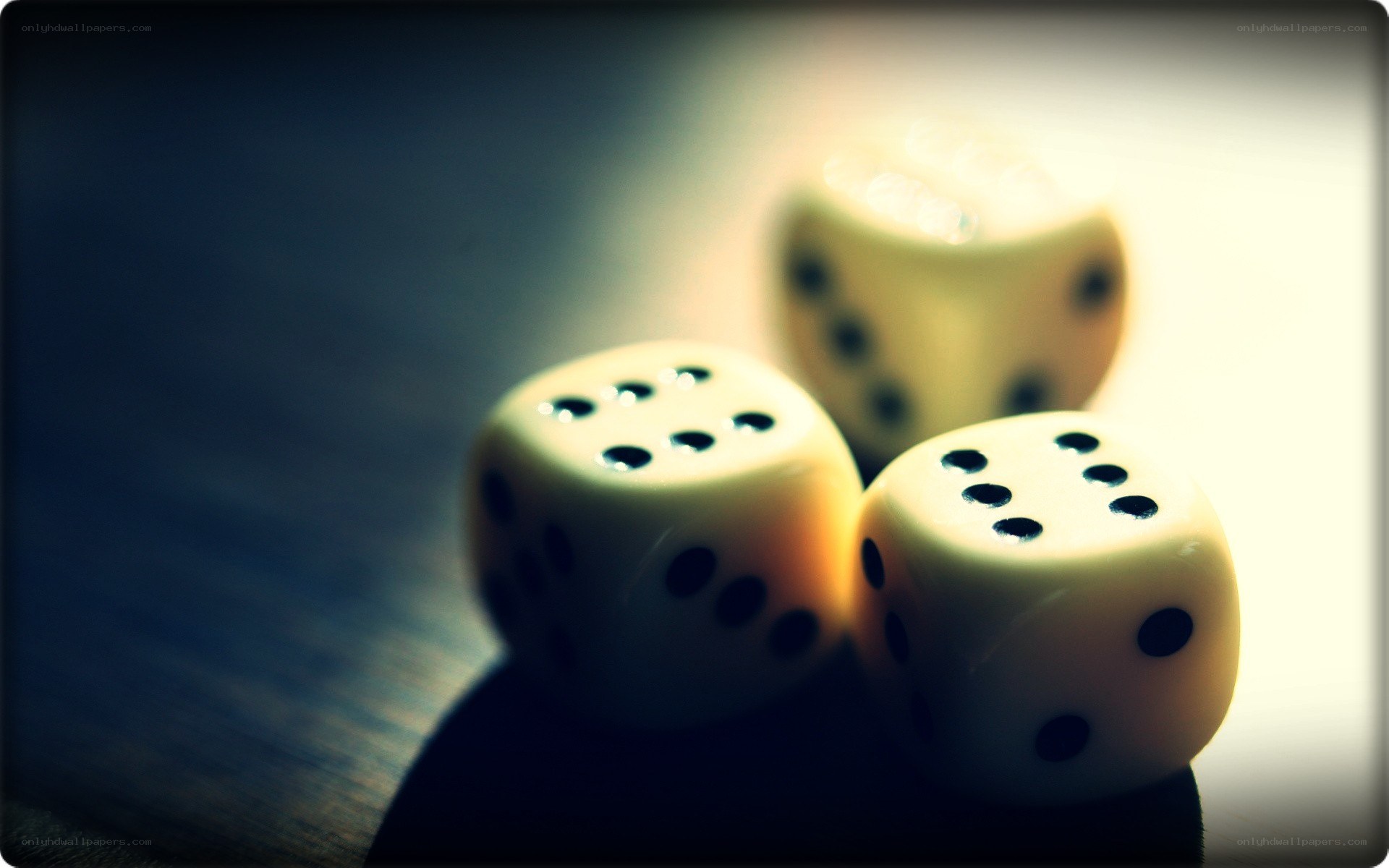 Three dice on a table