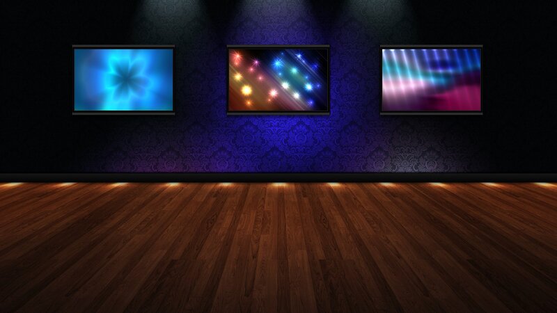 Three Digital Screens on Wall