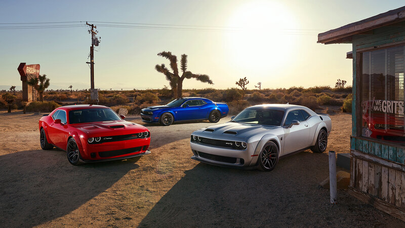 Three Dodge Challengers — Red