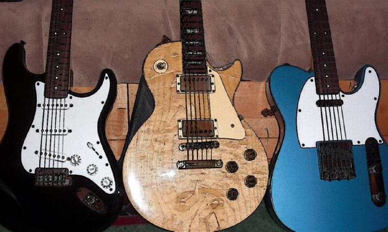 Three Electric Guitars — Black
