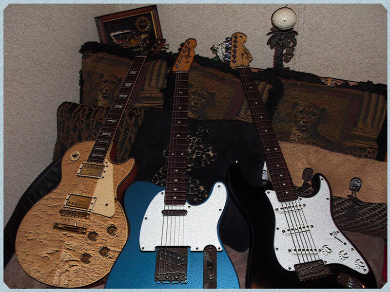 Three Electric Guitars — Blue