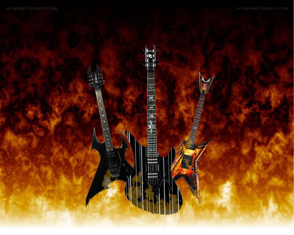 three electric guitars on fire