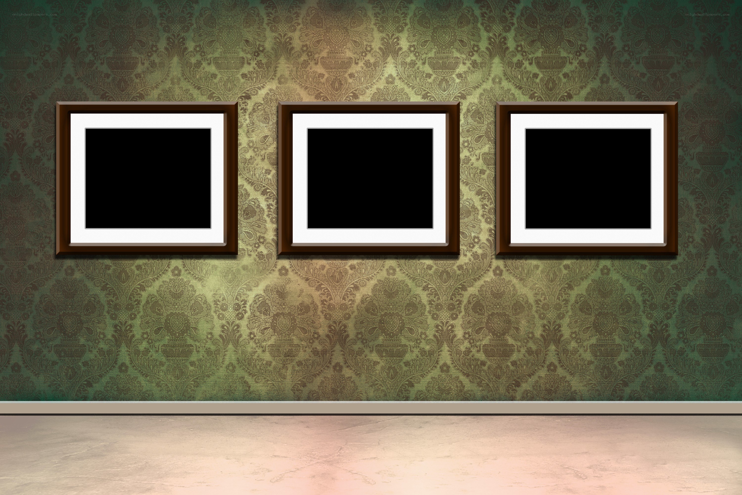 Three empty frames on a wall