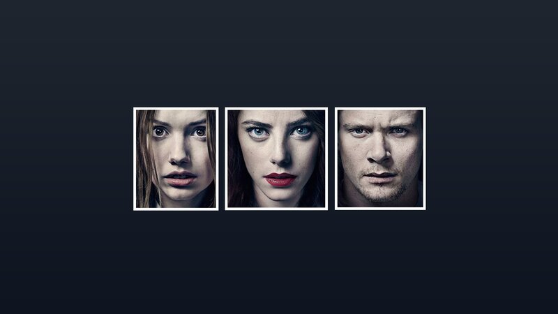 three faces in dark background