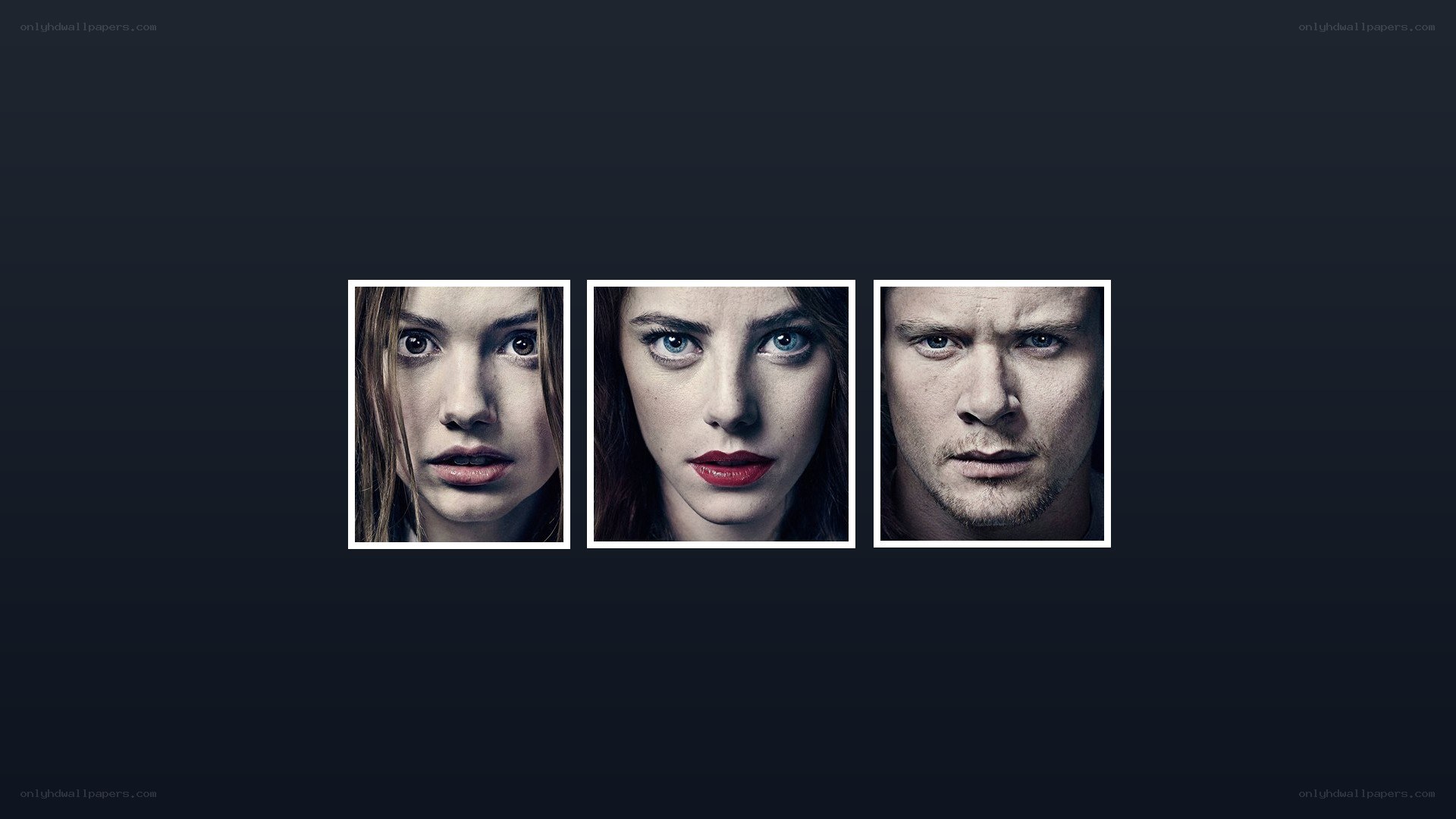 three faces in dark background
