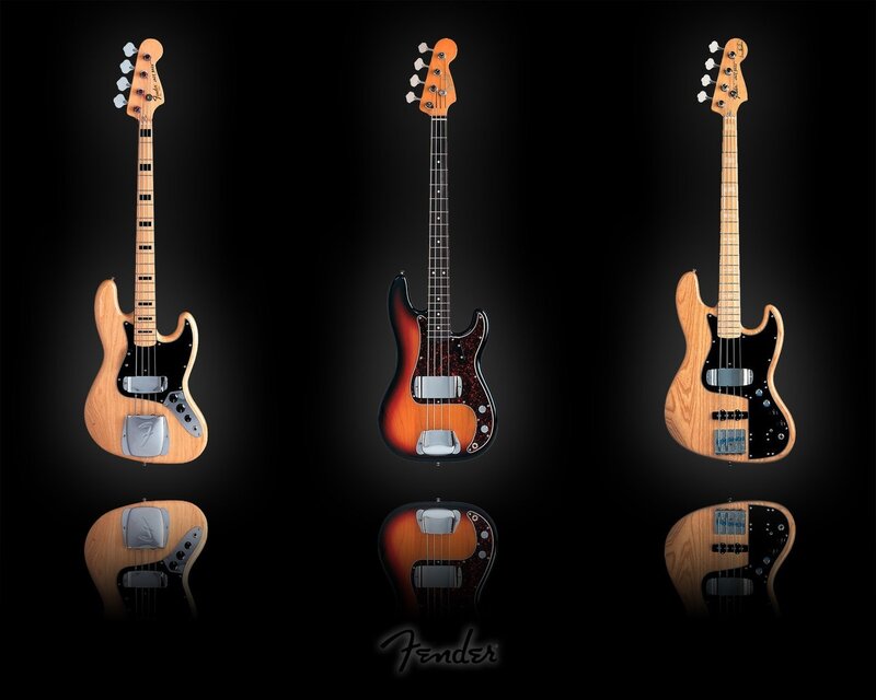 Three Fender bass guitars