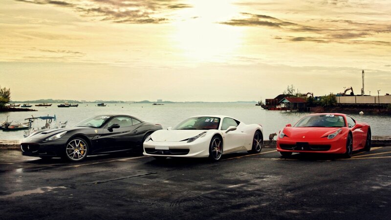 Three Ferraris on a Pier