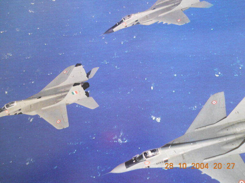 Three Fighter Jets in Flight — Blue