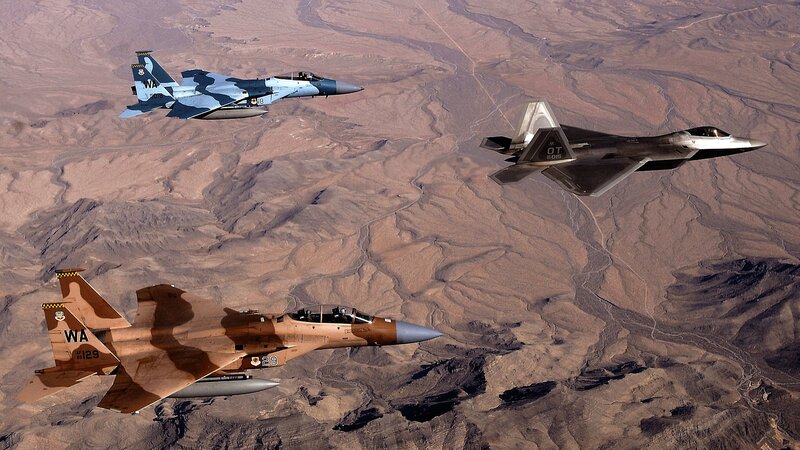 Three Fighter Jets in Flight — Brown