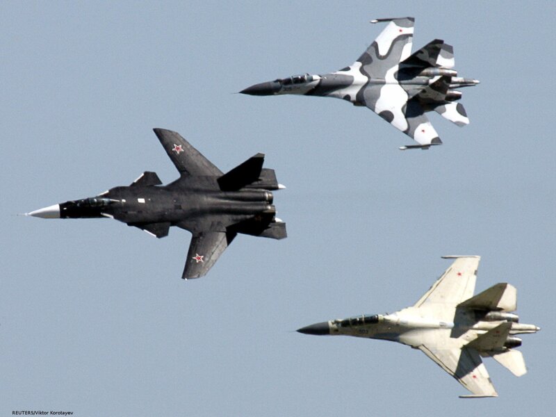 Three fighter jets in formation