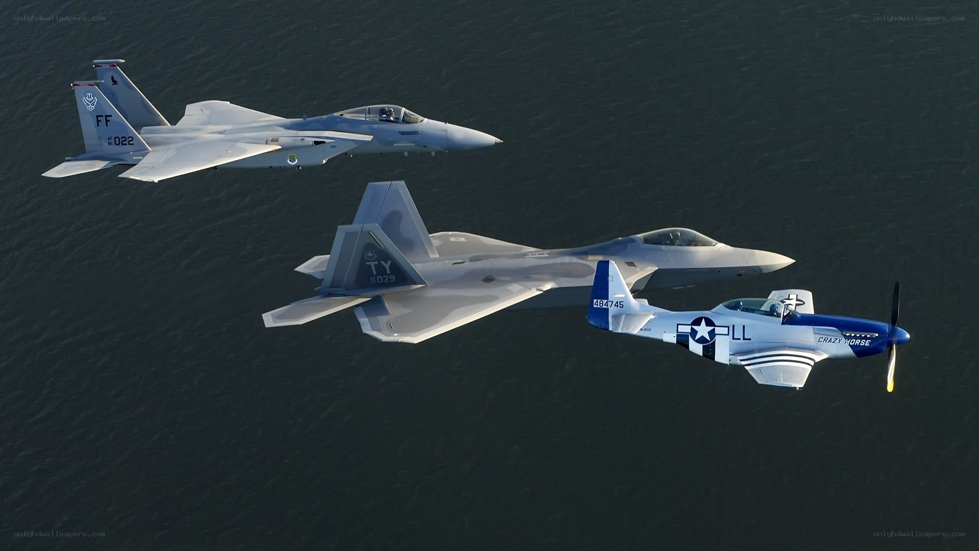 Three fighter jets in formation