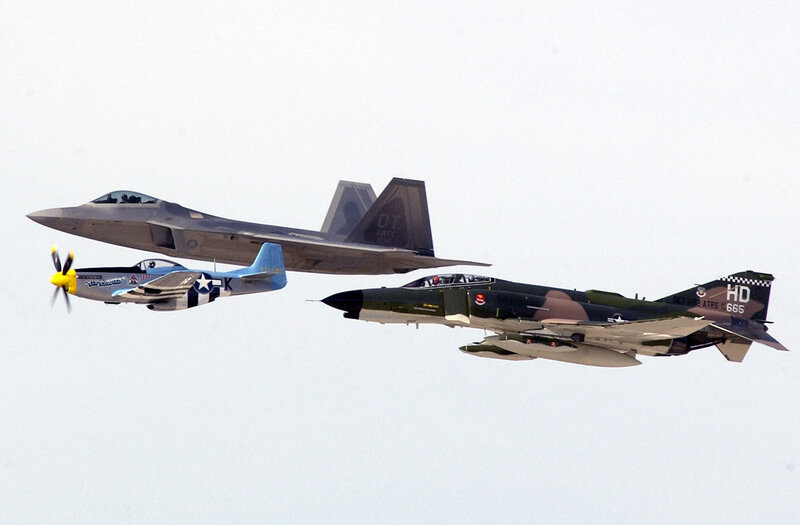 Three fighter jets in formation