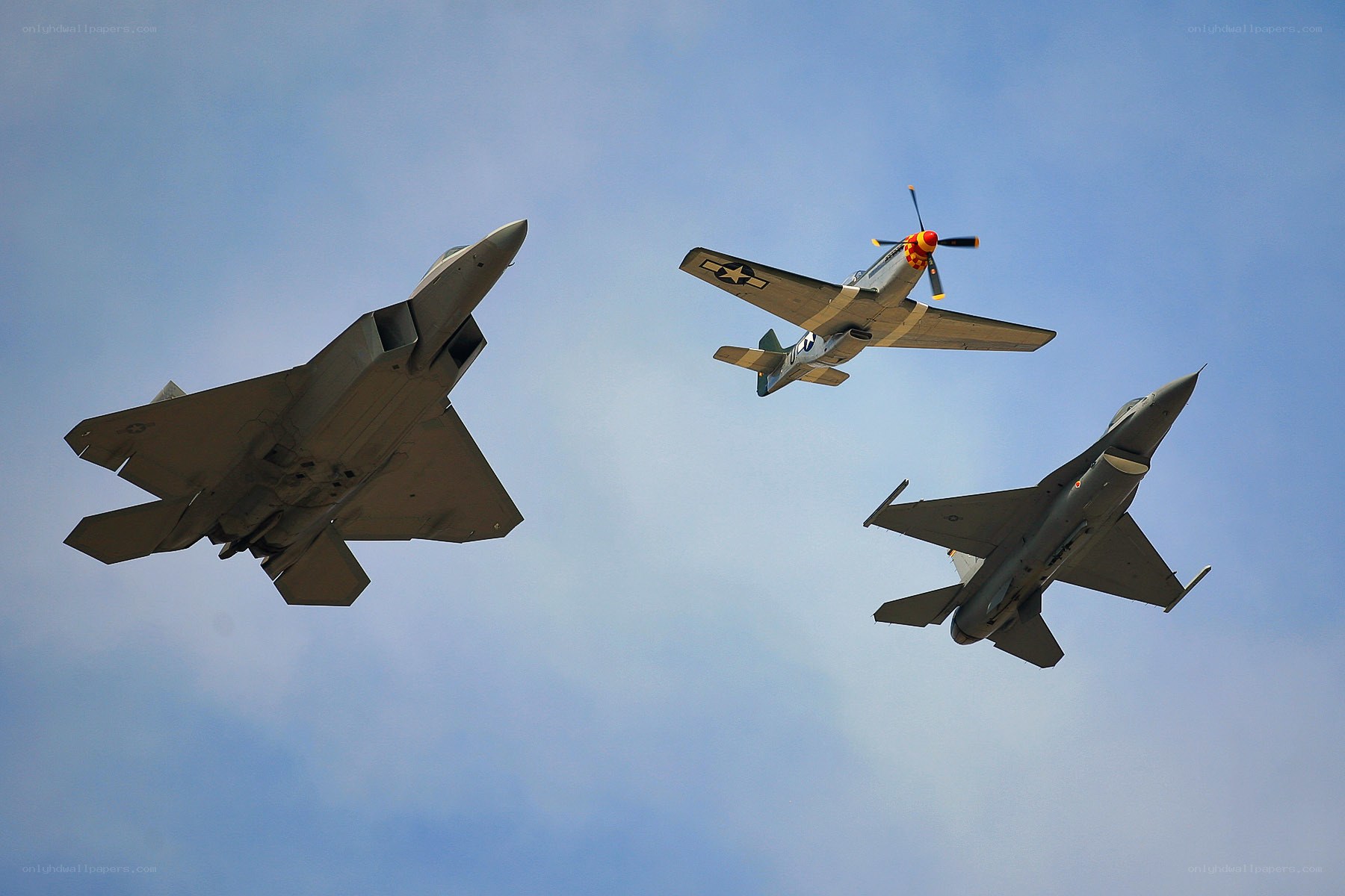 Three fighter jets in formation