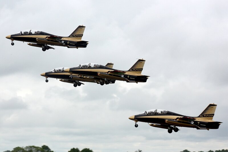 Three Fighter Jets in Formation — Black, Dynamic