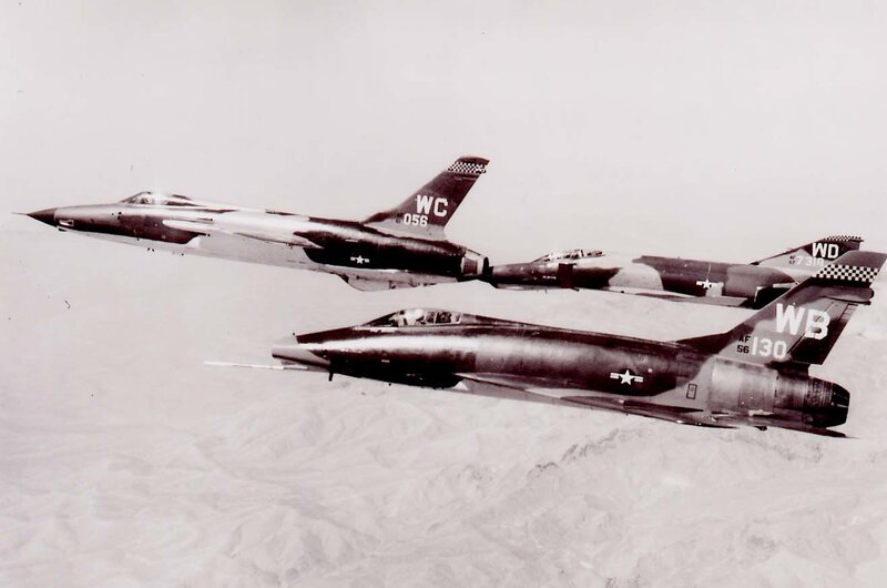 Three Fighter Jets in Formation — Black