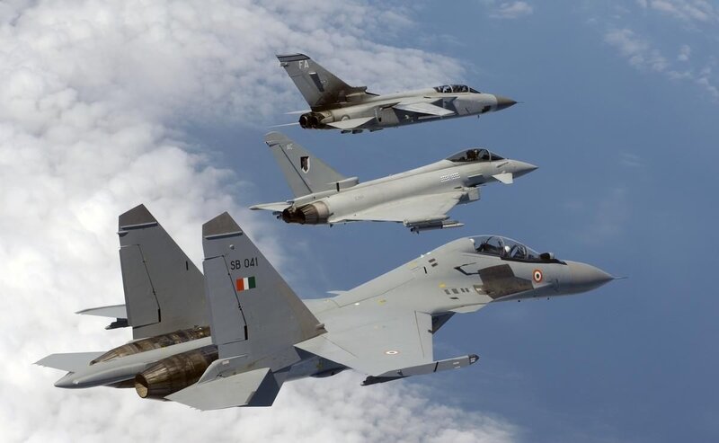 Three Fighter Jets in Formation — Gray, Aerial