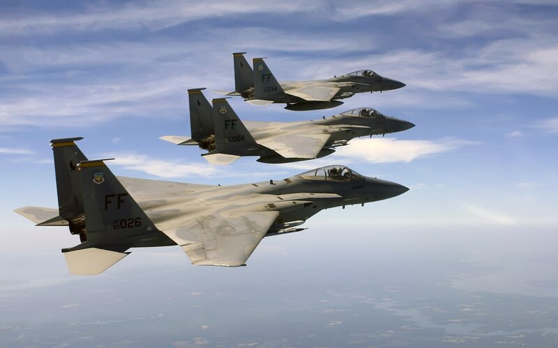 Three Fighter Jets in Formation — Gray, Calm, Afternoon