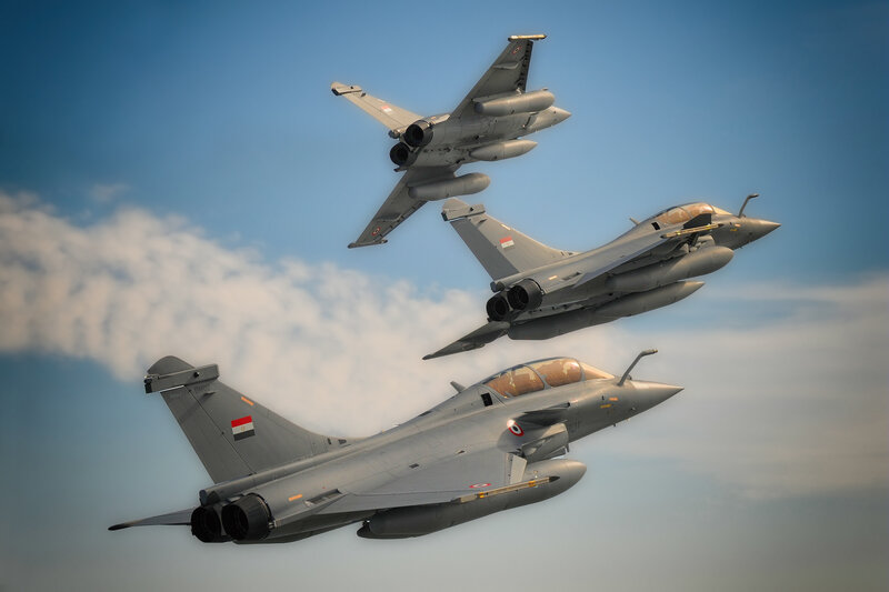 Three Fighter Jets in Formation — Gray, Dynamic, Afternoon