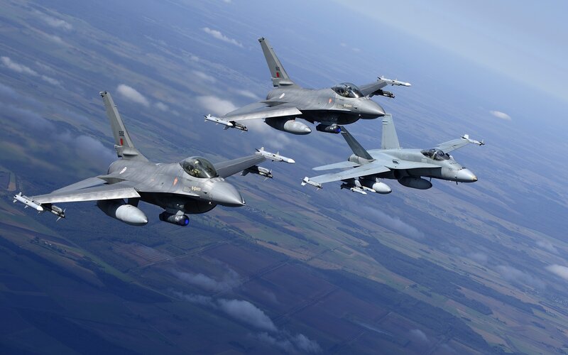 Three Fighter Jets in Formation — Gray, Dynamic