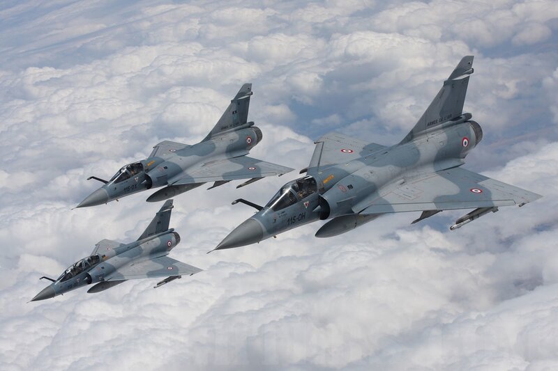 Three Fighter Jets in Formation — Gray