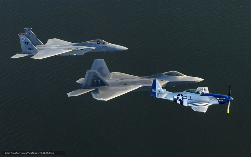Three fighter jets in formation