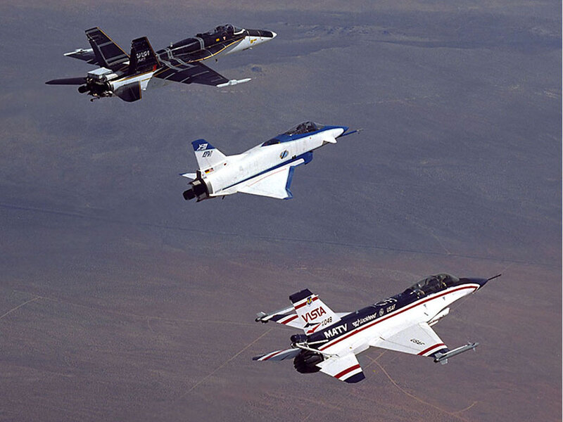 Three Fighter Jets in Formation — White