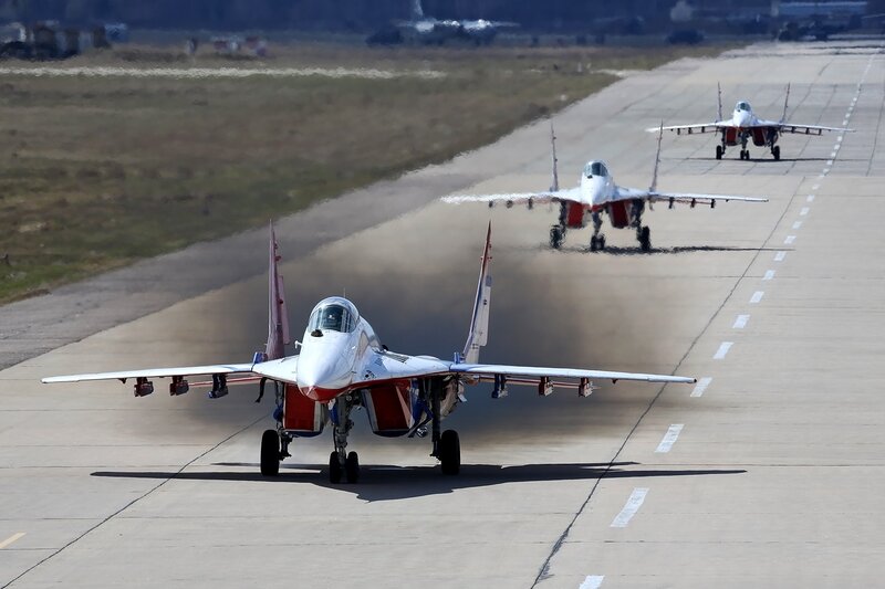 Three Fighter Jets on Runway
