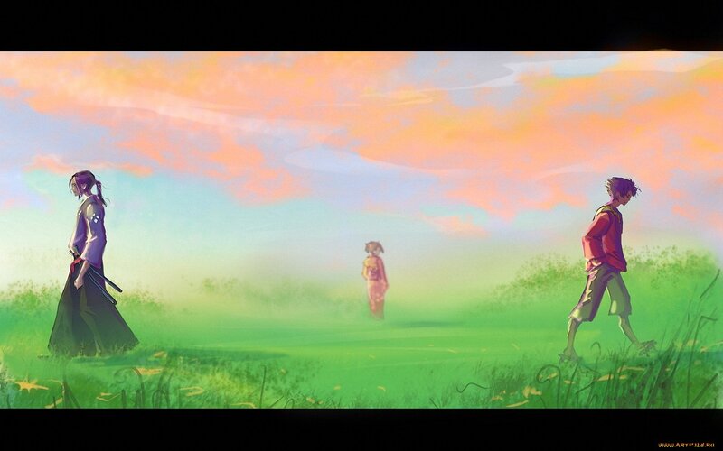 Three figures in a field at sunset