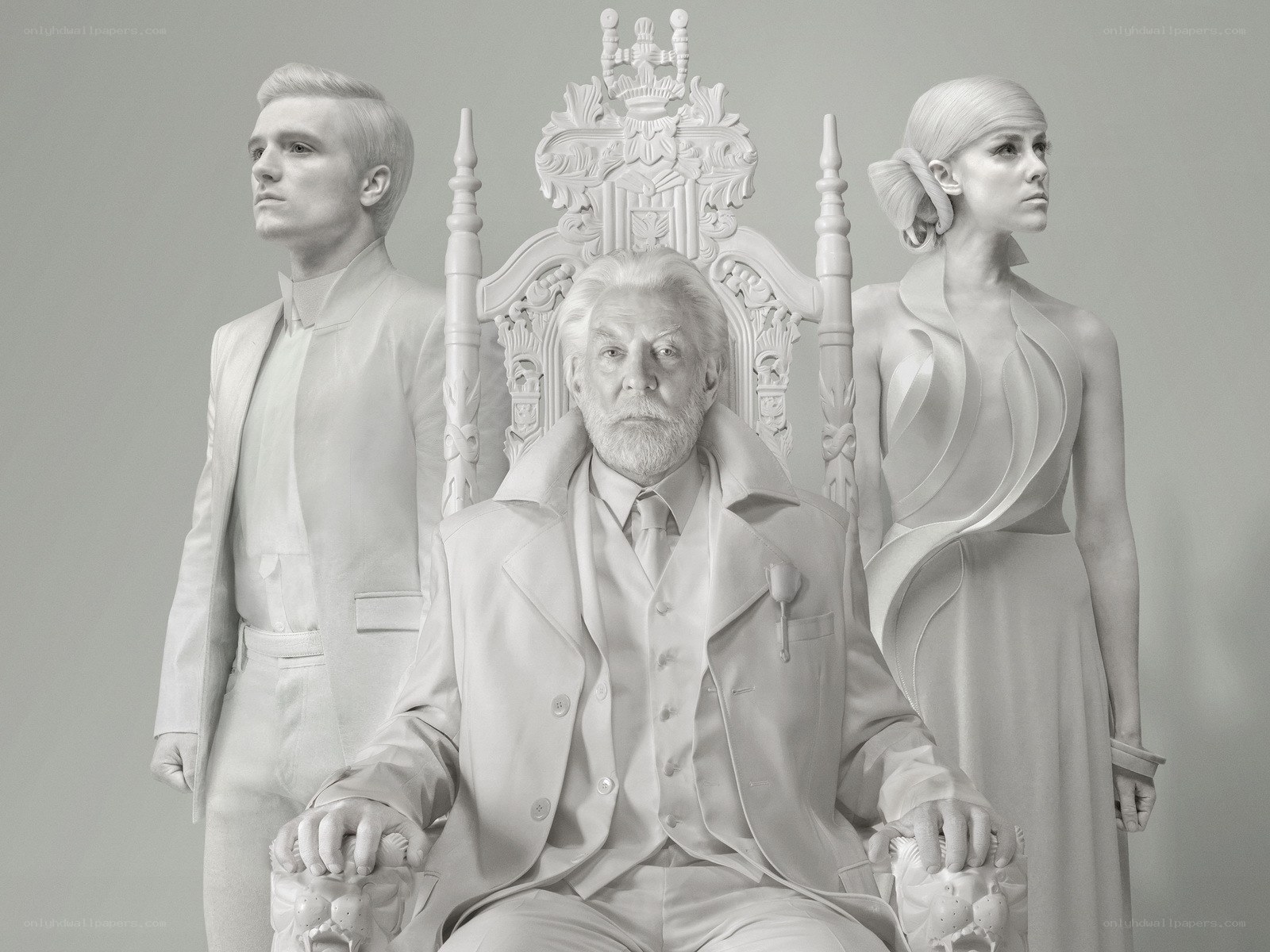 Three figures in white attire