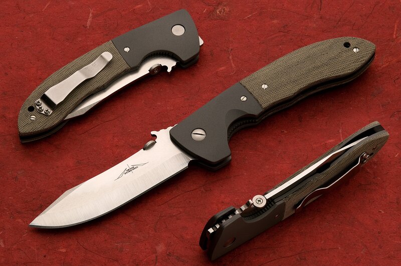 three folding knives on red