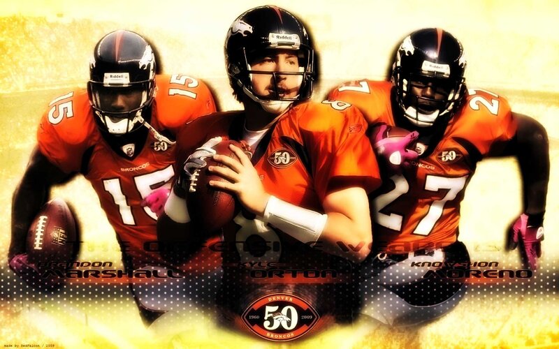 Three Football Players — Orange, Dramatic