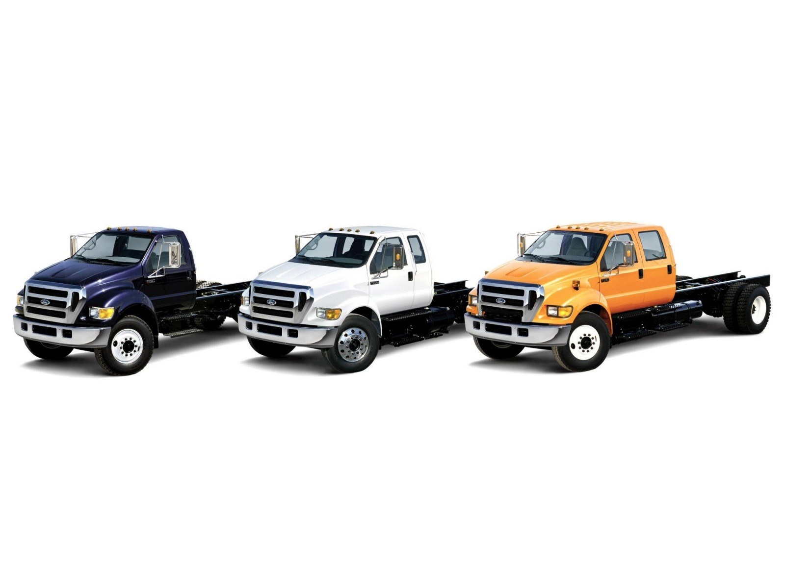 Three Ford F-Series trucks