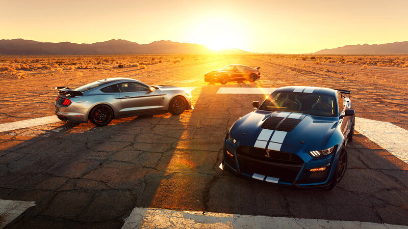 Three Ford Mustang Cars — Blue