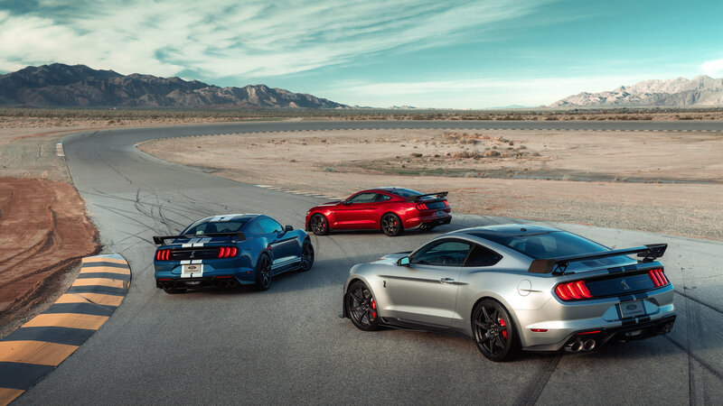 Three Ford Mustang Cars — Silver
