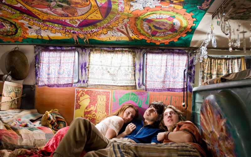 Three friends in a psychedelic van