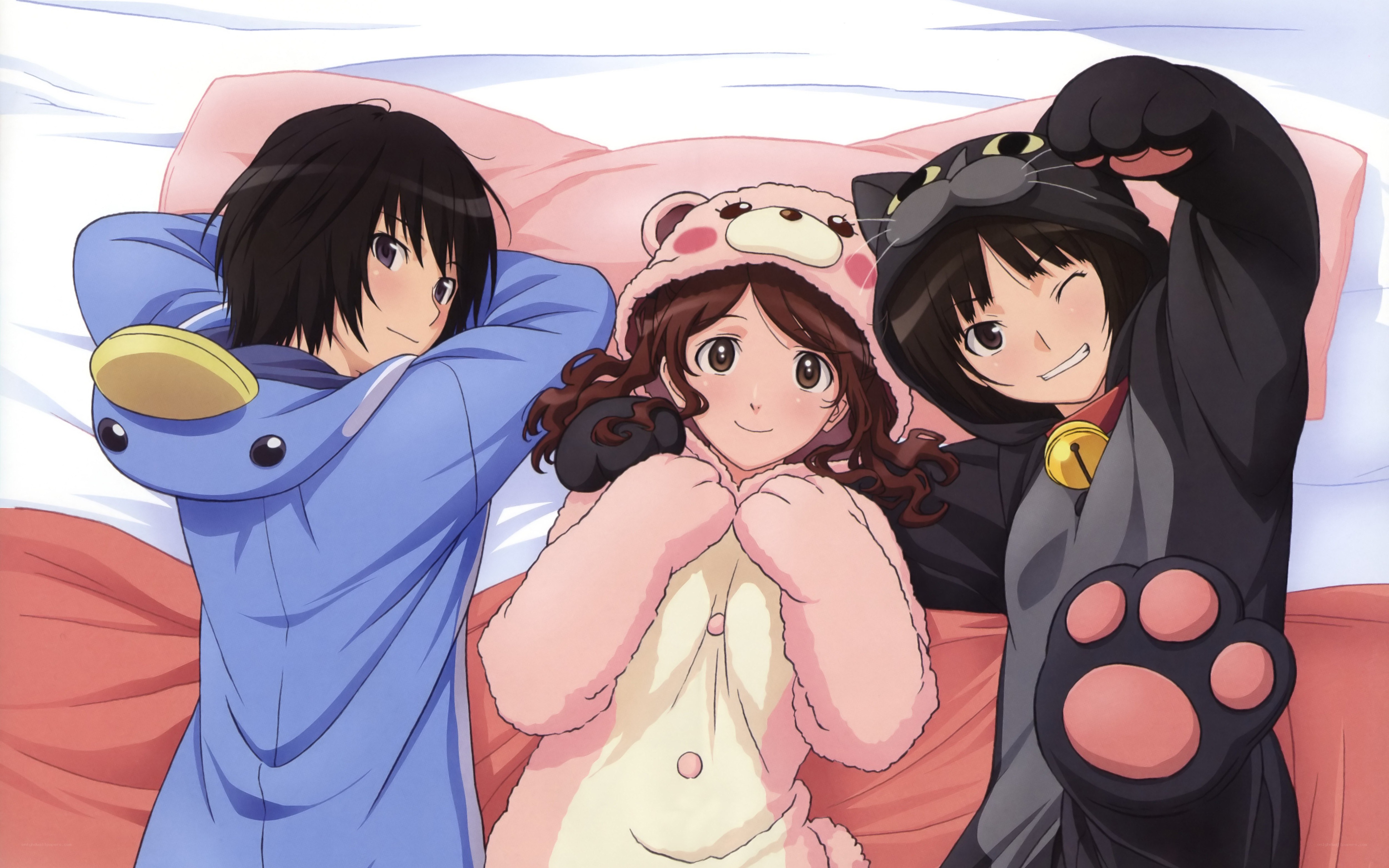 Three friends in animal onesies