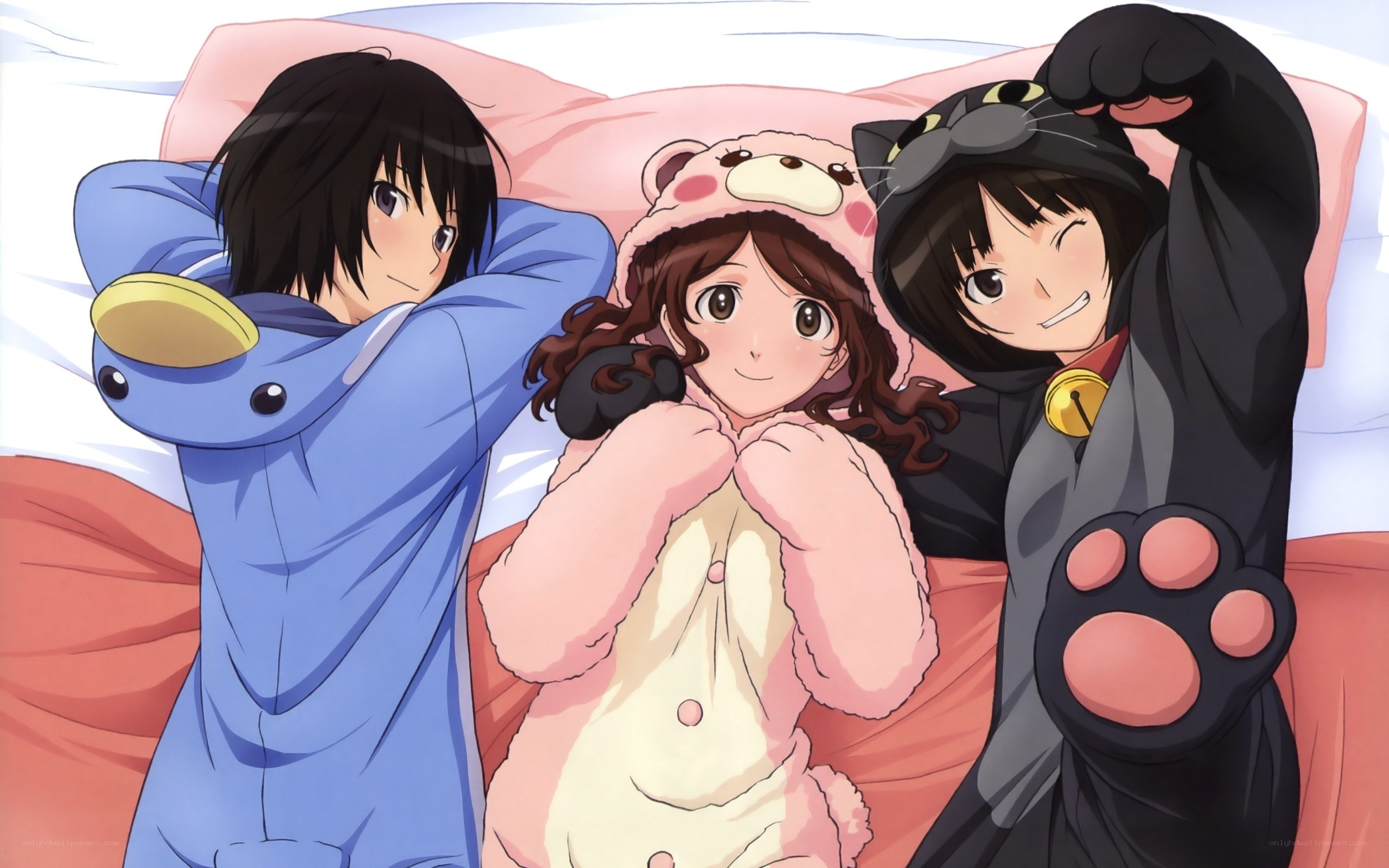 Three friends in animal onesies