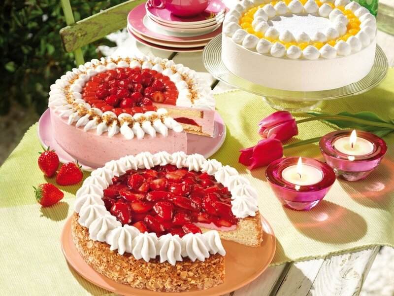 Three Fruit Cakes on Table