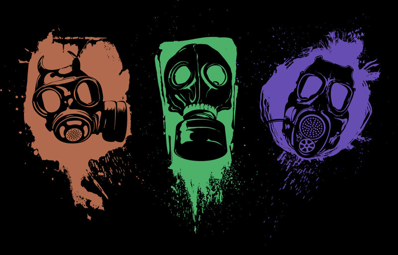 three gas masks in splattered colors