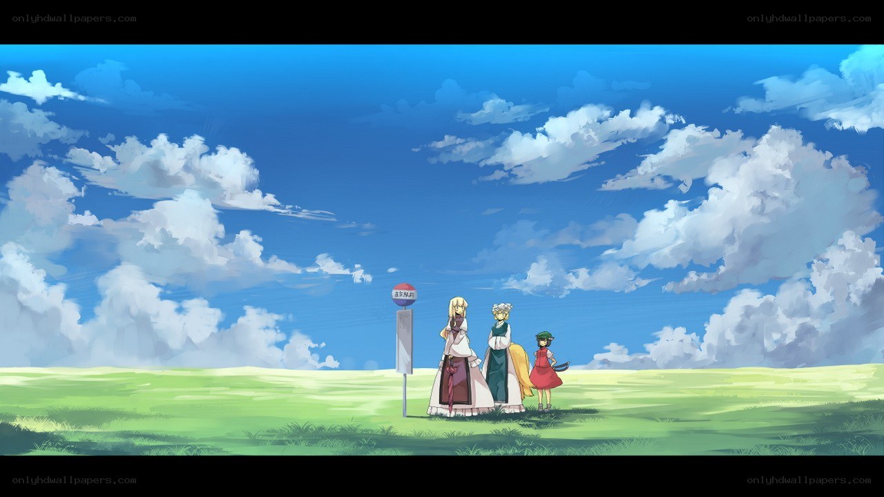 Three girls at a bus stop