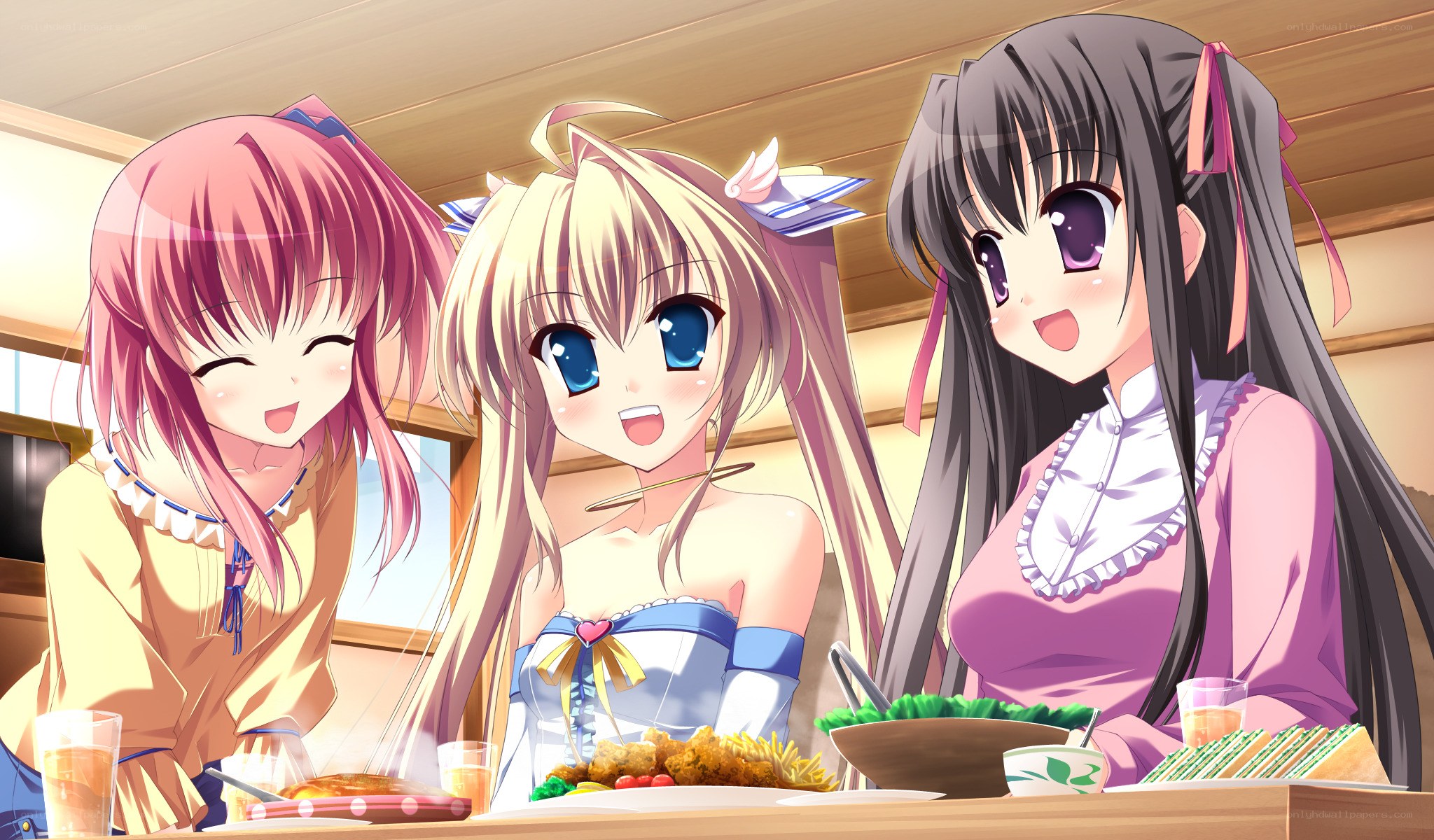 Three girls at a meal