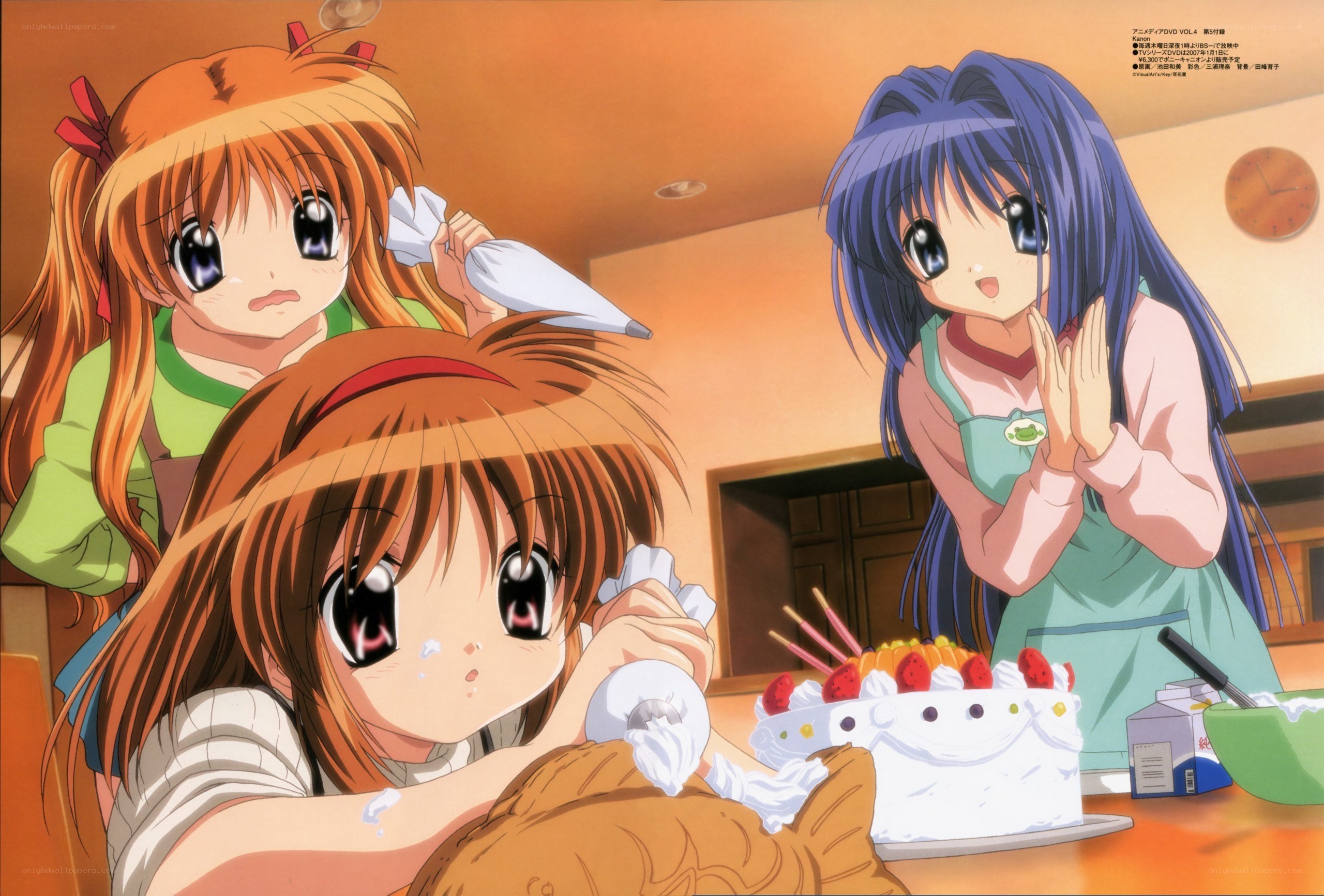 Three girls baking a cake