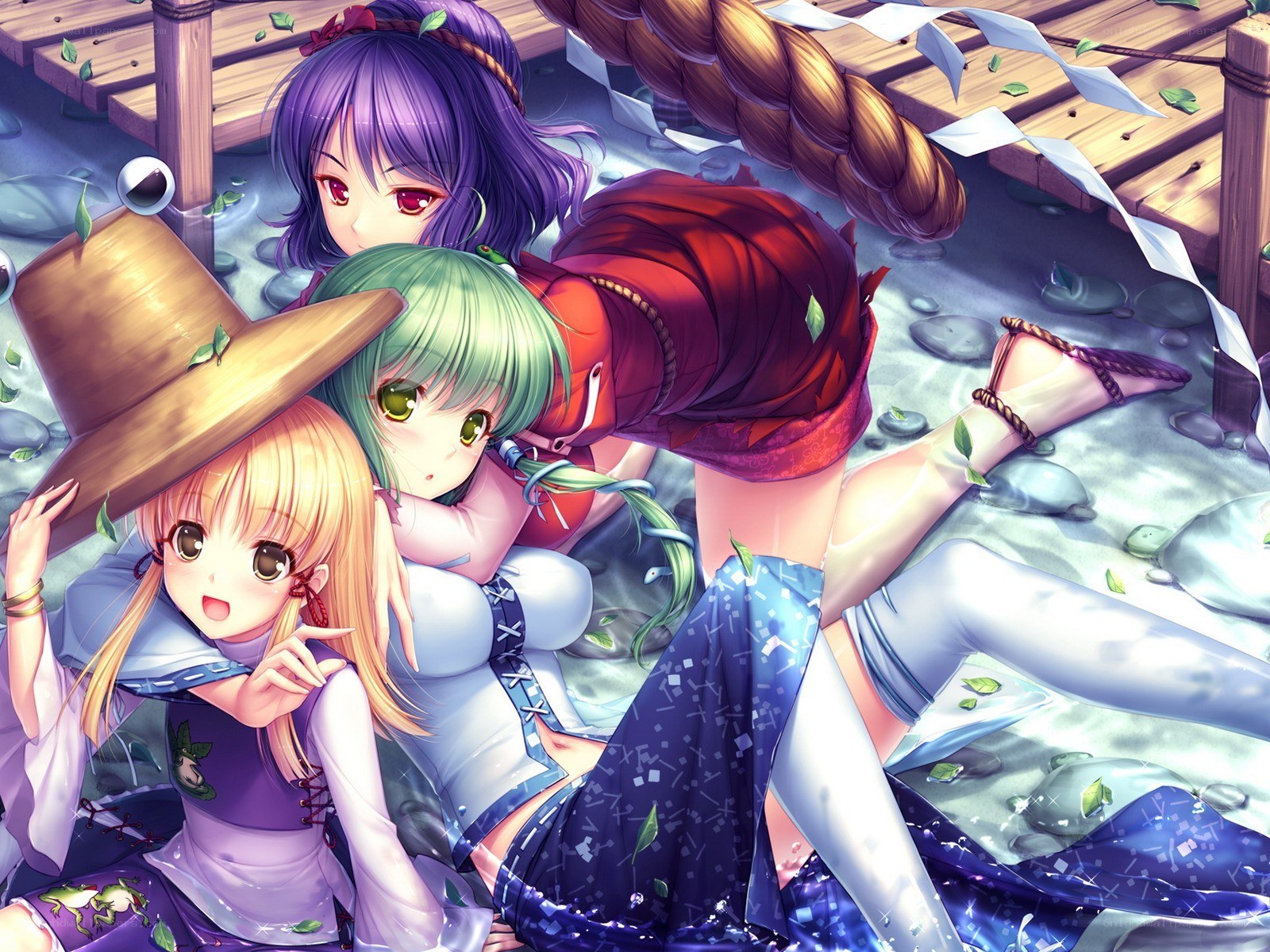 Three girls by the water