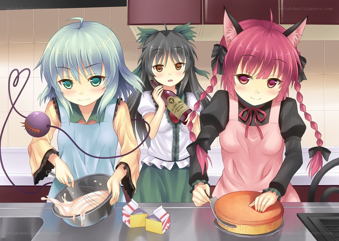 Three girls cooking in a kitchen