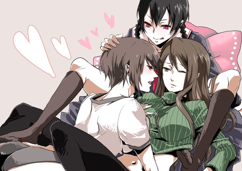 Three girls cuddling on a couch