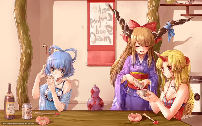 Three girls drinking tea together