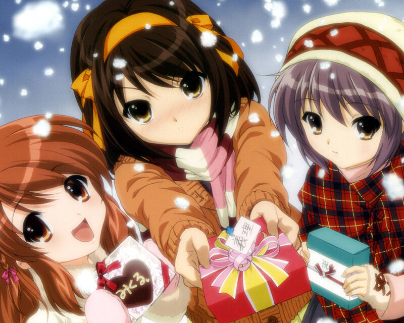 Three girls exchanging gifts in snow