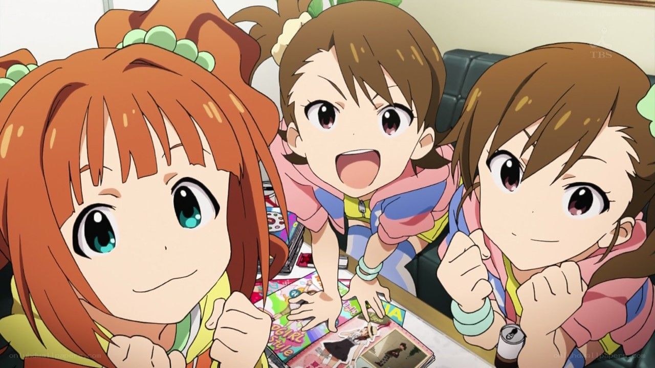 three girls excited over magazines