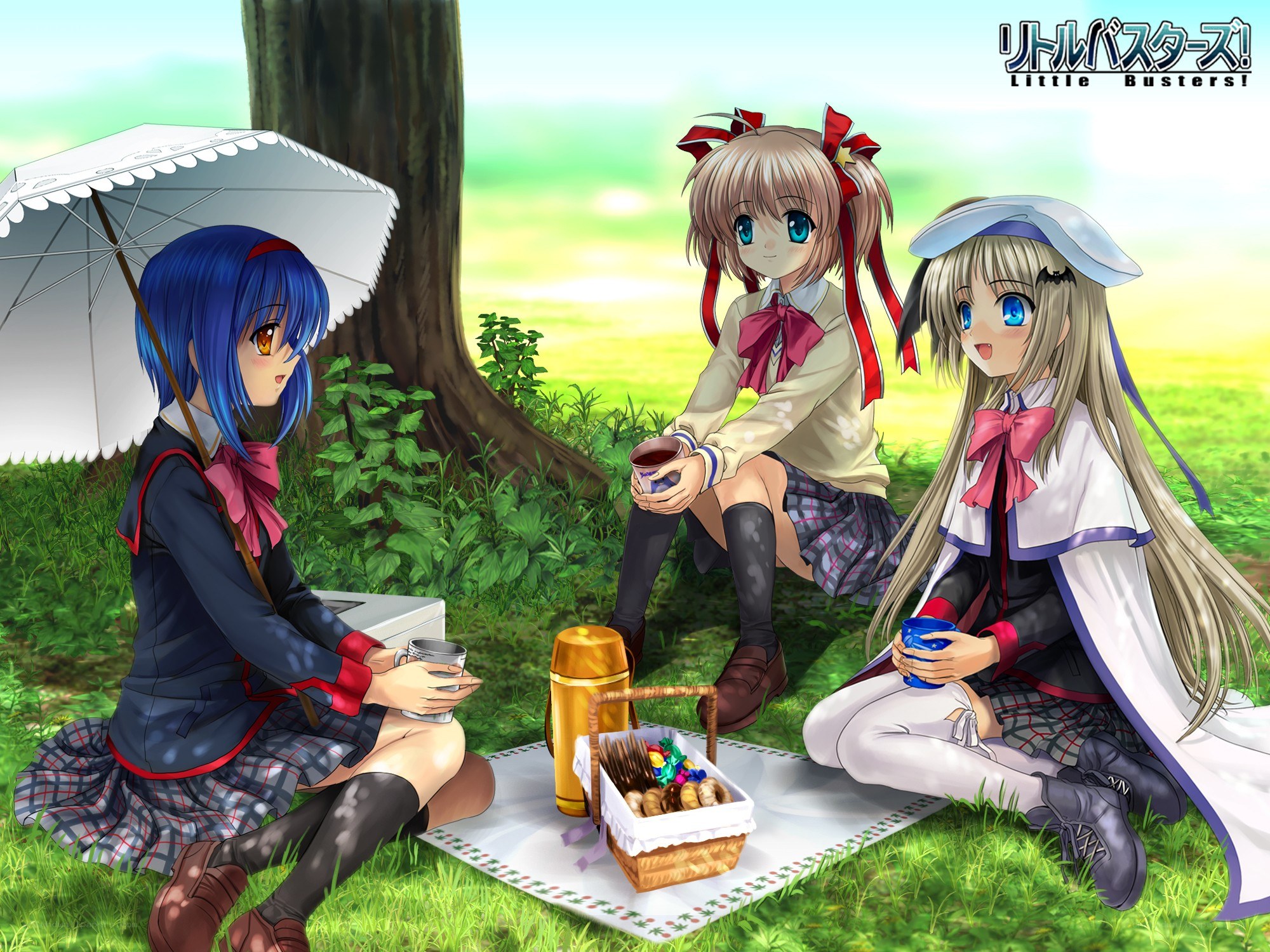 Three girls having a picnic