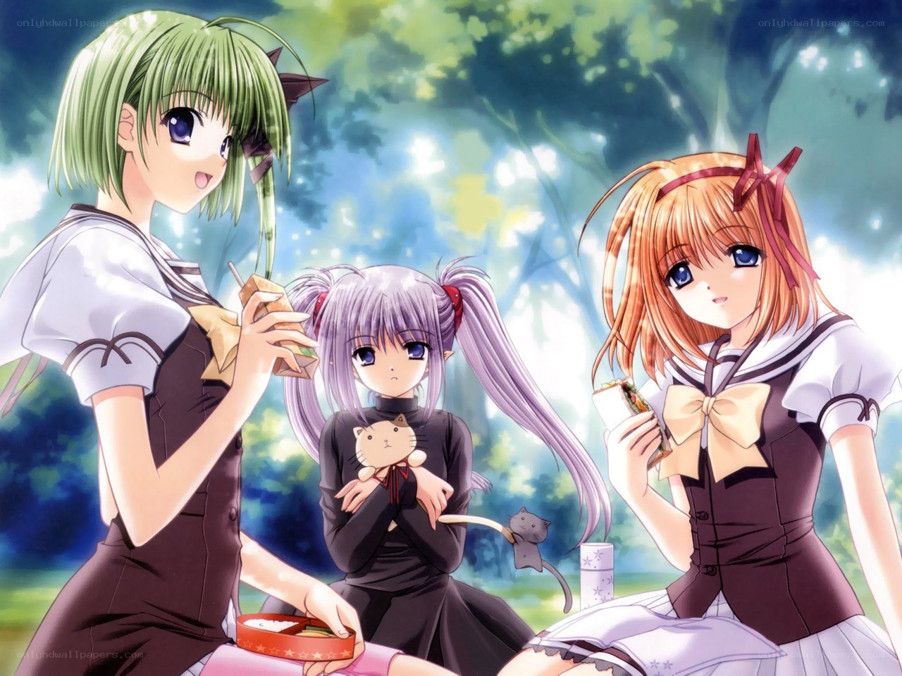 Three girls having a picnic